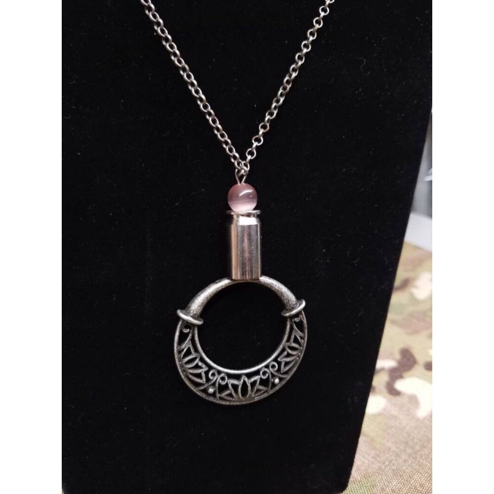 Silver bullet shell and ring necklace